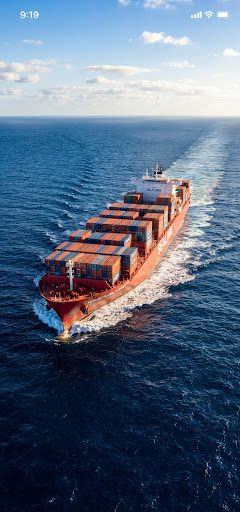 Ocean merchant navy vessel sailing through open sea waters